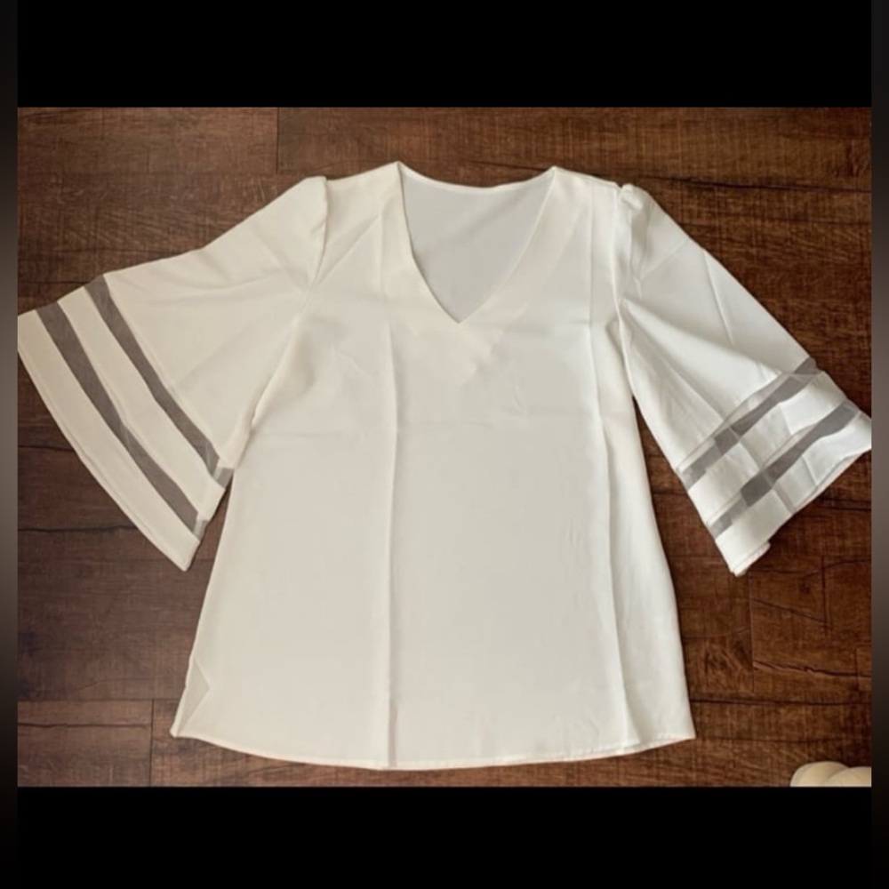 White bell sleeve blouse